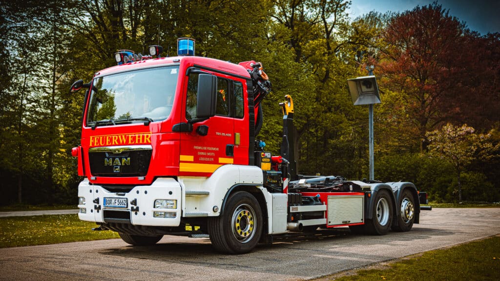 Wechselladerfahrzeug mit Kran